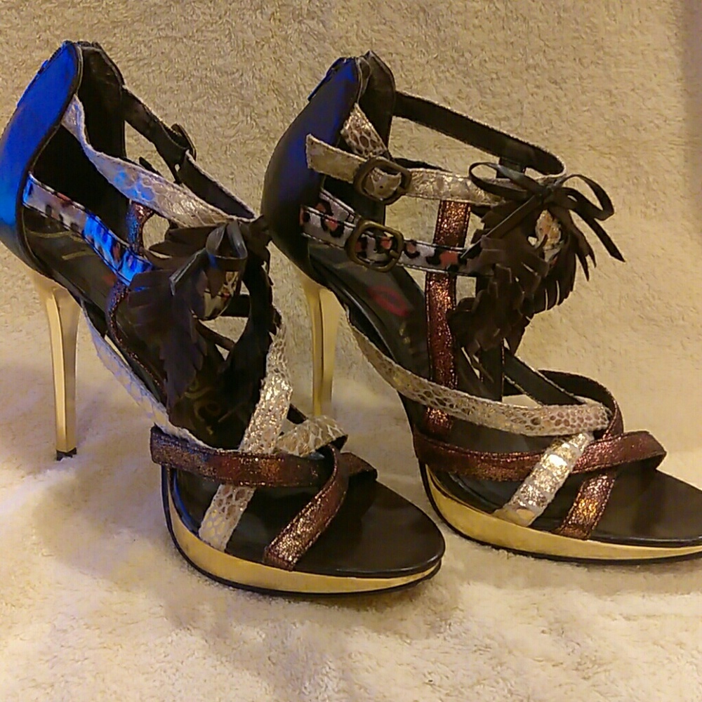 Brown and gold shoes